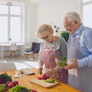 Older couple preparing healthy food